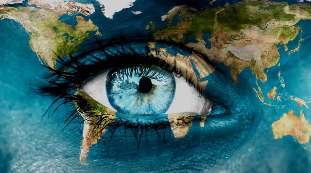 Planet earth and blue human eye - "Elements of this image furnished by NASA"